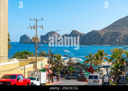 View from the touristic Playa El Medano beach area with colorful cafes and shops along the sandy coastline of Cabo San Lucas, Mexico. Stock Photo