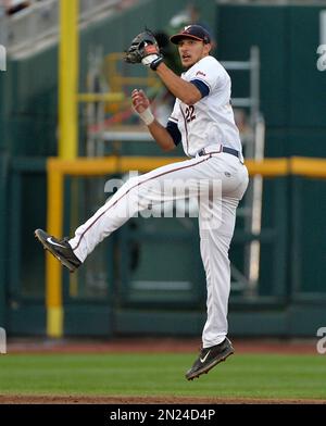 June 24, 2015: After fielding a ground ball, Vanderbilt shortstop Dansby  Swanson #7 underhands the ball to teammate 2nd baseman Tyler Campbell #2 to  turn the double-play in action during game 3