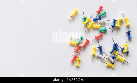 A colorful push pins isolated on a white background with copy space. Stock Photo