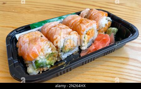 Sushi in plastic container takeout dinner Stock Photo
