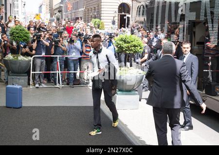 Juventus Soccer Club player Paul Pogba shops with his mother and