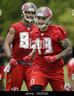 Tampa Bay Buccaneers wide receivers coach Kevin Garver wears a Love for  Damar shirt in honor of injured Buffalo Bills player Damar Hamlin before  an NFL football game against the Atlanta Falcons