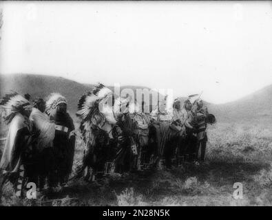 Group of Native Americans in Full Regalia at the 10th Anniversary of the Battle of Little Bighorn Stock Photo