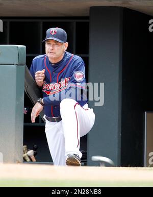 Toronto Blue Jays Paul Molitor, right, is greeted in the dugout as