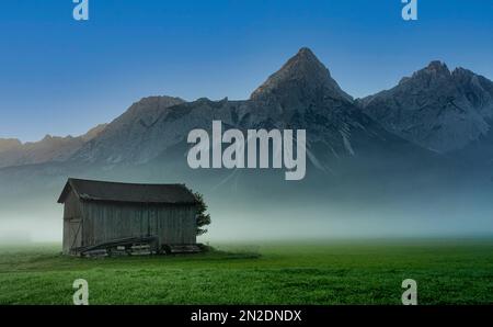 Morning fog on the Wetterstein mountains, Ehrwald, Tyrol, Austria Stock Photo