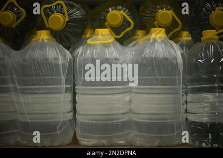Water bottles. Water in store. Bottles in plastic packaging. Water in stock. Stock Photo