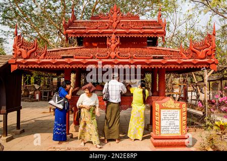 Water dispenser in front of Dhammayazika Pagoda, Bagan, Myanmar Stock Photo