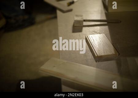 Items in garage. Workplace for creating structure. Production shop. Working tools on table. Stock Photo