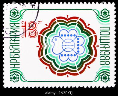 MOSCOW, RUSSIA - FEBRUARY 4, 2023: Postage stamp printed in Bulgaria shows Dove, New Year 1988 serie, circa 1987 Stock Photo