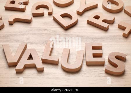 Word VALUES made with letters on wooden background Stock Photo