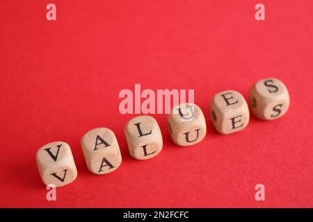 Beads with word VALUES on red background Stock Photo