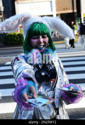 Portrait of a young Japanese woman taken in Harajuku, Tokyo, Japan. Stock Photo