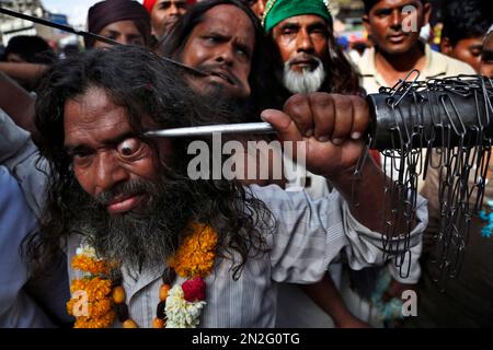 Muslim Sufi devotee use sharp objects to self-flagellate in a ...
