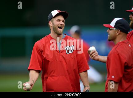 The jersey of Washington Nationals' Bryce Harper is signed on the letters  as he prepares to bat during the inning first inning against the New York  Mets at Nationals Park, Sunday, Sept.