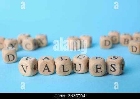 Beads with word VALUES on light blue background Stock Photo