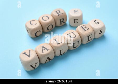 Beads with phrase CORE VALUES on light blue background Stock Photo