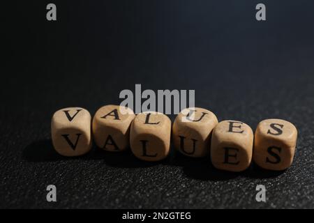 Beads with word VALUES on black background Stock Photo