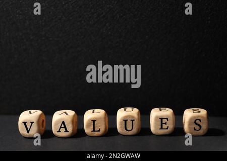 Beads with word VALUES on black background Stock Photo