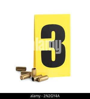 Shell casings and crime scene marker with number Stock Photo - Alamy