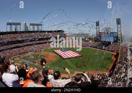 Fans cheer after the National Anthem as the Philadelphia Phillies