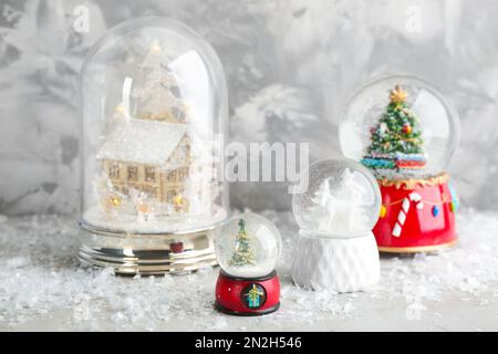 Set of different beautiful snow globes on isolated on white. Banner ...