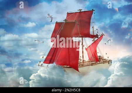Dream world. Sailing ship floating among wonderful fluffy clouds Stock Photo