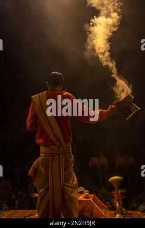 Ganga Aarti, Hindu priest conducts religious Ganga Aarti ritual (fire ...