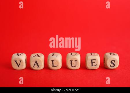 Beads with word VALUES on red background Stock Photo