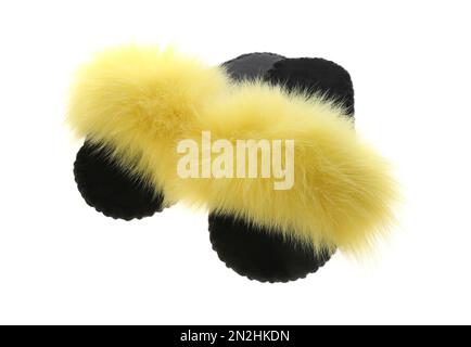 Pair of soft open toe slippers with yellow fur on white background Stock Photo