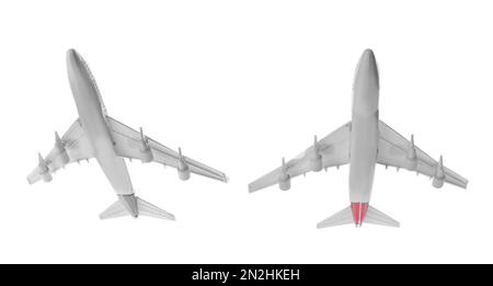 Two toy airplanes isolated on white, bottom view Stock Photo