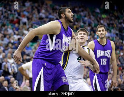 Utah Jazz forward Jack Cooley (45) defends against Sacramento Kings center  Sim Bhullar (32) during the fourth quarter of an NBA basketball game  Wednesday, April 8, 2015, in Salt Lake City. The