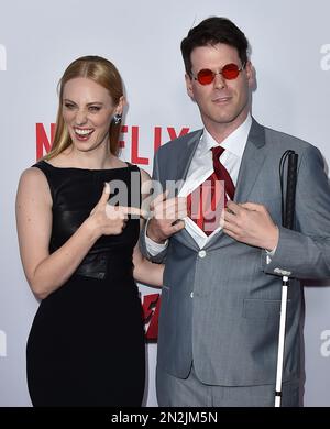E.J. Scott, right, and Deborah Ann Woll arrive at 'Marvel's Daredevil' on Thursday, April 2, 2015 in Los Angeles. (Photo by Jordan Strauss/Invision/AP)