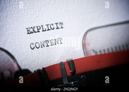 Explicit content text written with a typewriter. Stock Photo