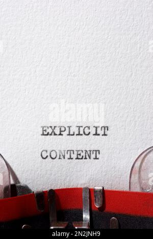 Explicit content text written with a typewriter. Stock Photo