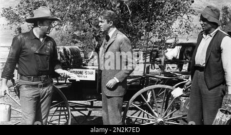 THE MAN WHO SHOT LIBERTY VALANCE 1962 Paramount Pictures film with from left:  John Wayne, James Stewart,  Woody Strode Stock Photo