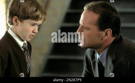 THE SIXTH SENSE 1999 Buena Vista Pictures Distribution film with Bruce Willis at right and Haley Joel Osment Stock Photo