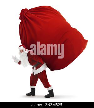 Santa Claus carrying enormous red bag full of Christmas gifts on white ...