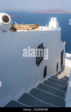 Fira, Santorini, Greece - August 2022 : Stairs towards the port landing in the Fira city Stock Photo