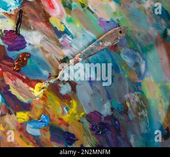 macro close-up of various colors of oil paint. colorful acrylic. a modern concept of art. palette knife. Stock Photo