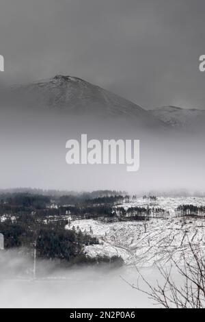 UK, Scotland. Winter landscape in the Scottish Highlands, mountains, hills and fields covered with snow Stock Photo