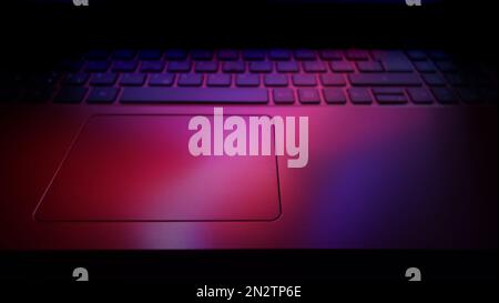 laptop computer keyboard illuminated with lights effects Stock Photo