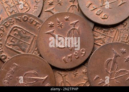 Collection old Dutch VOC coins from 1789 close up full frame as background Stock Photo