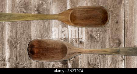 Topview of Cooking Wooden Spoons on Table Background Stock Photo