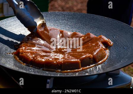 Pan-fried rice cakes in picnic camping Stock Photo