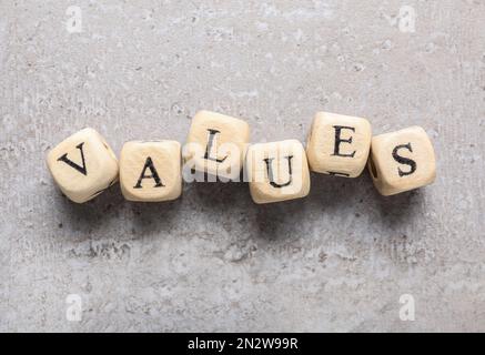 Beads with word VALUES on grey background, flat lay Stock Photo