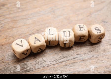 Beads with word VALUES on wooden background Stock Photo