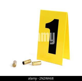 Shell casings and crime scene marker with number three isolated on ...