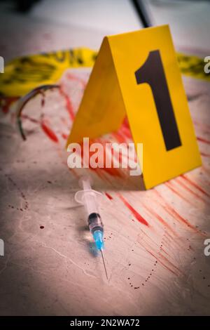 Syringe and crime scene marker with number four isolated on white Stock ...