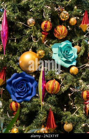 Close-up view of the Christmas ornaments hanging on the Christmas tree. Stock Photo