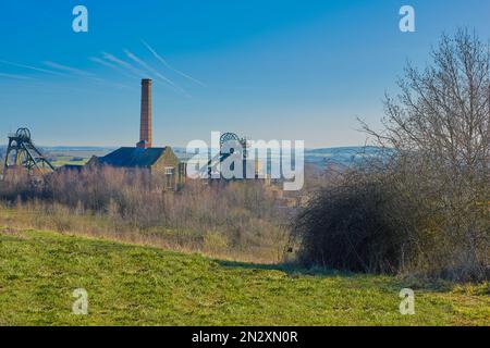Picturesque landscape image with a coal mine in view. Stock Photo